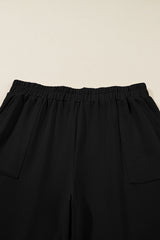 Black Elastic Waist Asymmetrical Hem Capri Plus Size Pants